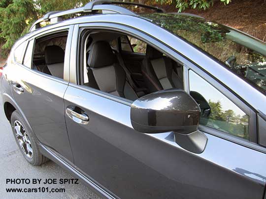 2018 Subaru Crosstrek Premium body colored outside mirrors,  dark rubber lower window trim, dark gray car with gray cloth shown
