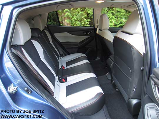 2018 Subaru Crosstrek Limited rear seat with center armrest.. Gray interior shown with dark and light gray. The light gray is actually darker than it appears in this photo.