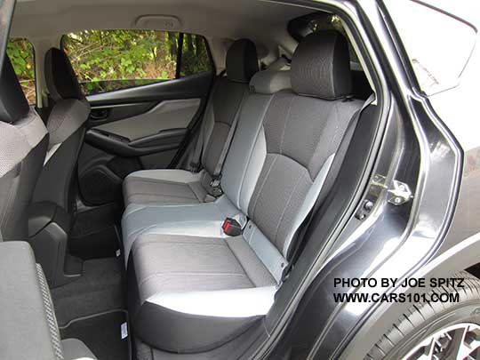 2018 Subaru Crosstrek 2.0i base model rear seat. Gray cloth interior shown with dark and light gray. Note the light gray is actually darker than it appears in this photo