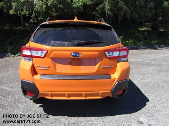 2018 Subaru Crosstrek rear view, with optional rear bumper cover. Reverse auto brake sensors are visible in the rear bumper