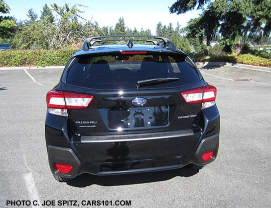 2018 crystal black silica Subaru Crosstrek Limited rear view, optional rear bumper cover