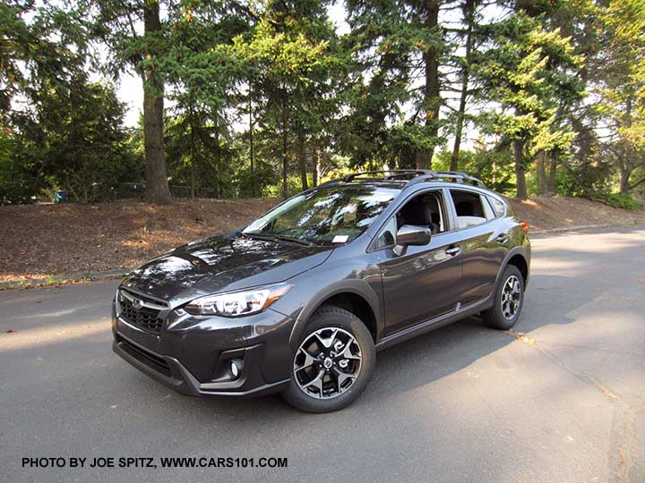 2018 Subaru Crosstrek Premium with 17" machined alloys, body colored outside mirrors. Dark gray color shown.