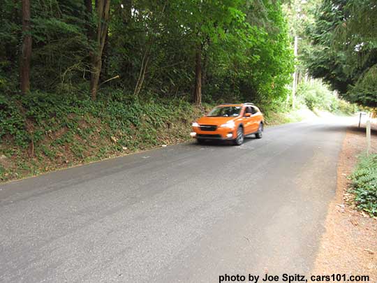 2018 Subaru Sunshine Orange Crosstrek on the road