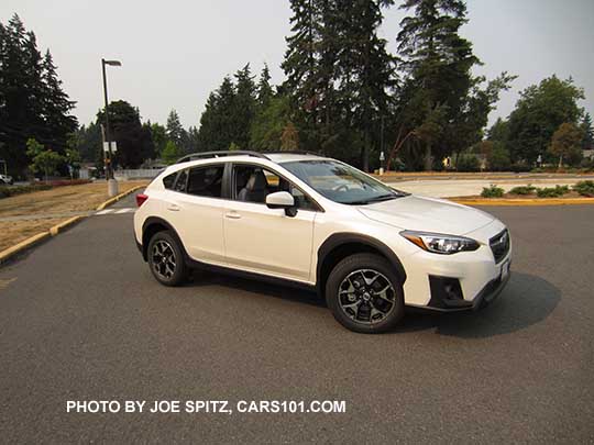 2018 Subaru Crosstrek Premium with 17" alloys, body colored outside mirrors. Crystal white color.