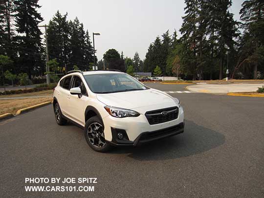 2018 Subaru Crosstrek Premium with body color outside mirrors, 17" alloys wheels. Crystal white color.