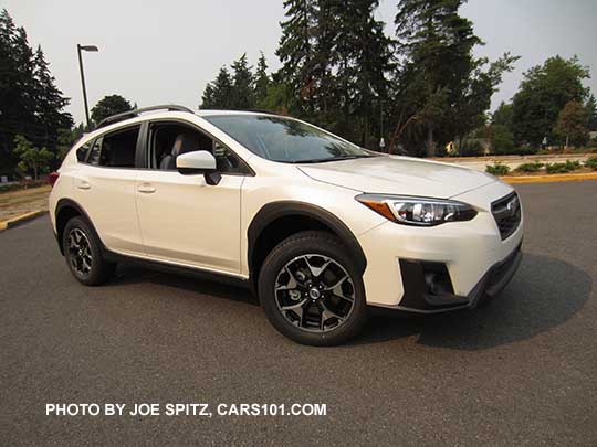 2018 Subaru Crosstrek Premium with body color outside mirrors, 17" alloys wheels. Crystal white color.