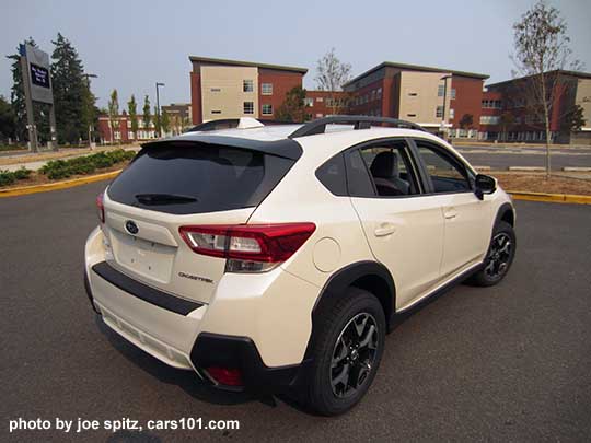 2018 Subaru Crosstrek Premium with crystal black rear spoiler, 17" alloys wheels. Crystal white color