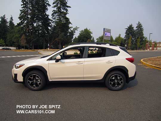 2018 Subaru Crosstrek Premium with crystal black rear spoiler, 17" alloys wheels. Crystal white color