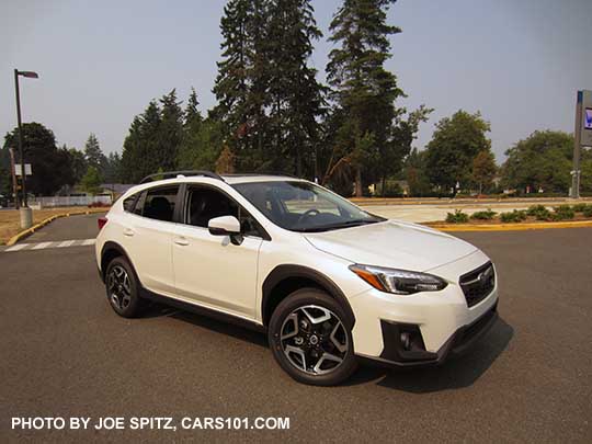 2018 Subaru Crosstrek Limited with crystal black rear spoiler, 18" Limited alloys wheels, turn signal mirrors.  Crystal white color