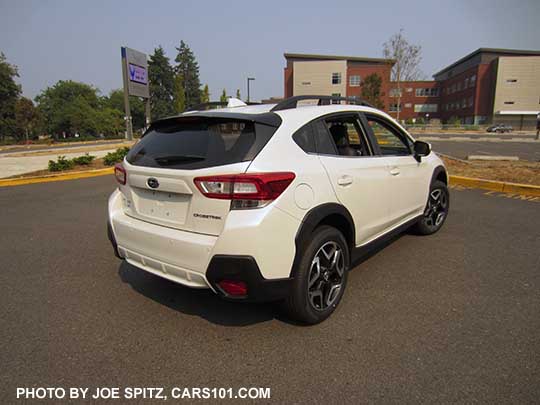 2018 Subaru Crosstrek Limited with crystal black rear spoiler, 18" Limited alloys wheels, turn signal mirrors.  Crystal white color