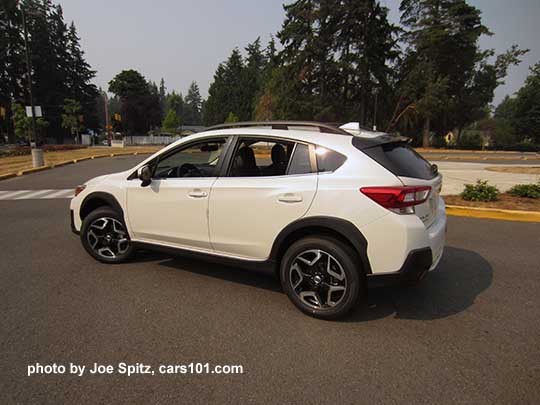 2018 Subaru Crosstrek Limited with crystal black rear spoiler, 18" Limited alloys wheels, turn signal mirrors.  Crystal white color