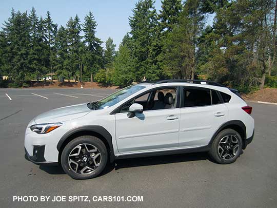 2018 Subaru Crosstrek Limited, cool gray khaki color. This color changes depending on sunlight vs shade. Optional body side moldings.