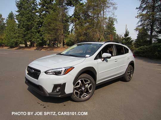 2018 Subaru Crosstrek Limited, cool gray khaki color. This color changes depending on sunlight vs shade. Optional body side moldings.