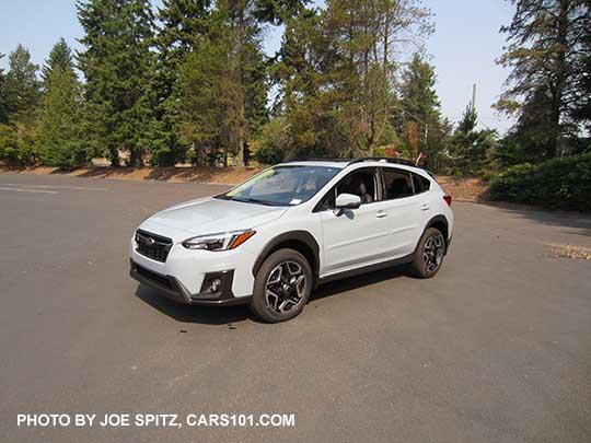 2018 Subaru Crosstrek Limited, cool gray khaki color. This color changes depending on sunlight vs shade. Optional body side moldings.