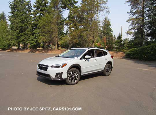 2018 Subaru Crosstrek Limited, cool gray khaki color. This color changes depending on sunlight vs shade. Optional body side moldings.