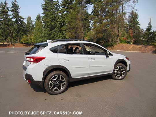 2018 Subaru Crosstrek Limited, cool gray khaki color. This color changes depending on sunlight vs shade. Optional body side moldings and STI rear spoiler