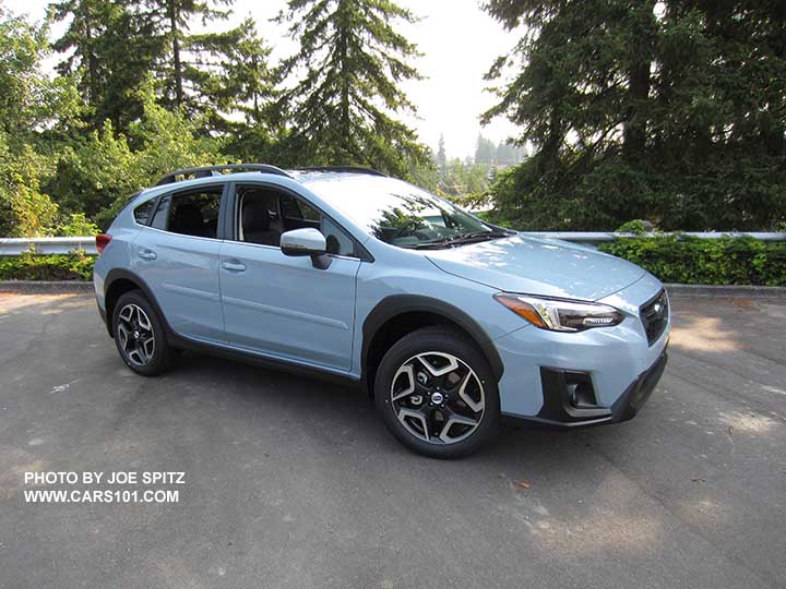 2018 Subaru Crosstrek Limited, cool gray khaki color. This color changes depending on sunlight vs shade. Optional body side moldings.