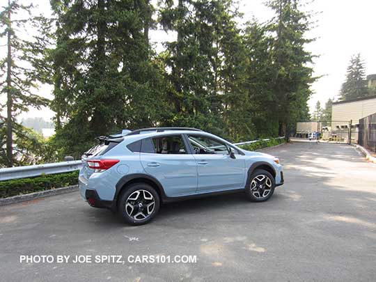 2018 Subaru Crosstrek Limited, cool gray khaki color. This color changes depending on sunlight vs shade (this is in the sun). Optional body side moldings and STI rear spoiler.