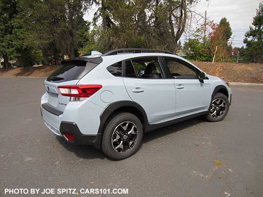 cool gray khaki 2018 Subaru Crosstrek Premium has 17" wheels, showing optional rear bumper cover