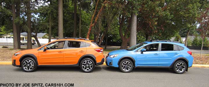 2018 all new redesigned Sunshine Orange Subaru Crosstrek Limited (note the wheels), with a 2016 HyperBlue Subaru Crosstrek