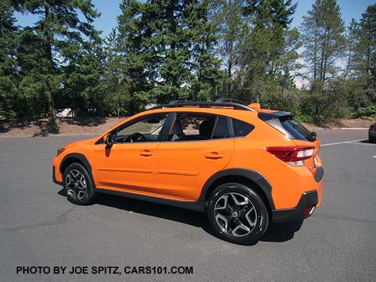 2018 Subaru Crosstrek Limited has 18" alloy wheels. Sunshine orange shown with optional body side moldings