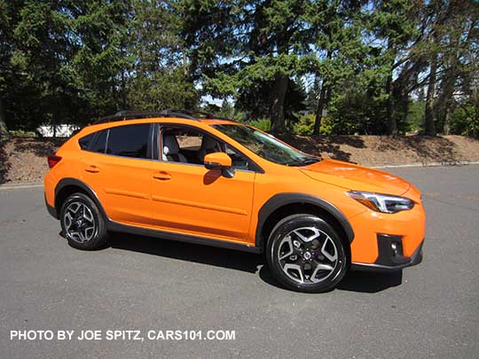 sunshine orange 2018 Subaru Crosstrek Limited has 18" alloy wheels. Shown with body side moldings