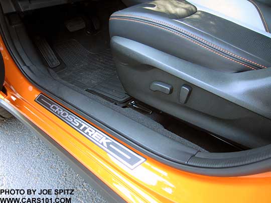 2018 Subaru Crosstrek optional door sill plates, driver's door shown. sunshine orange car.