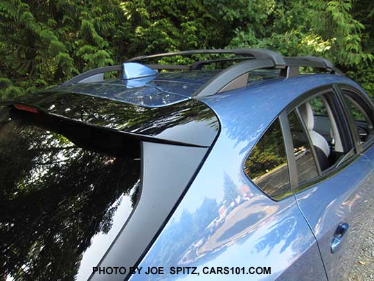 2018 Subaru Crosstrek gloss crystal black rear spoiler with LED upper brake light, standard on all models. Quartz blue car