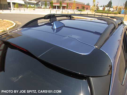 2018 Subaru Crosstrek gloss crystal black rear spoiler with LED upper brake light, standard on all models. Quartz blue car shown.