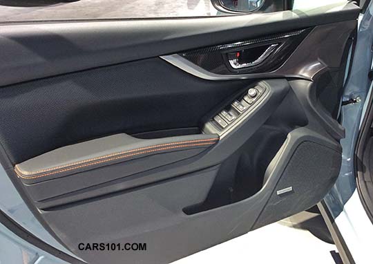 2018 Subaru Crosstrek Limited front door panel, orange stitching, gloss patterned trim. NY auto show