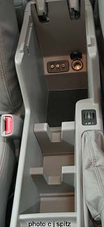 http://www.cars101.com/subaru/forester/forester09armrestconsole5.JPG