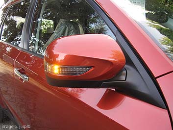 2011 Forester Touring models have turn signals in the outside mirrors