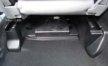 stereo subwoofer under driver seat, standard on Forester Touring models
