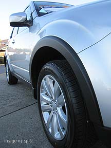 wheel arch molding, front wheel shown, 2011 subaru