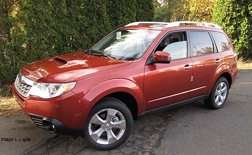 2011 Forester XT Touring model, Paprika Red Pearl shown