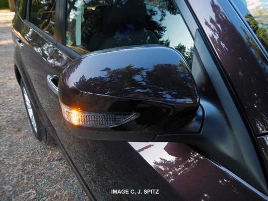 only the forester touring model has turn signals in the outside mirrors