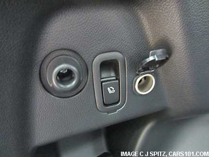 subaru forester cargo area 12v
                    power outlet, cargo hook, Touring model with rear
                    seat fold-down button shown