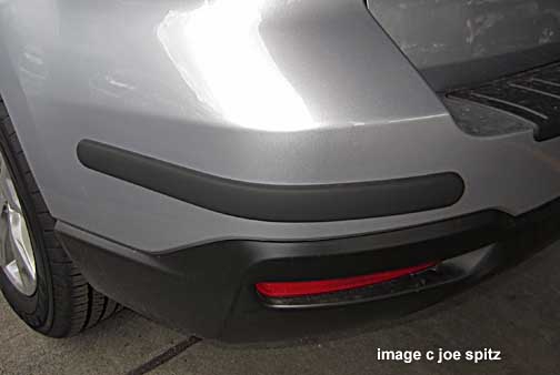 close-up of optional subaru forester rear corner molding, left corner shown