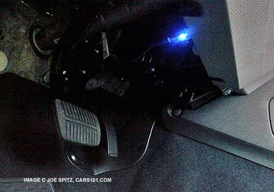 2014 forester optional footwell interior illumination kit. Driver's side, blue shown
