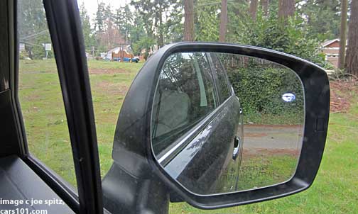 Subaru Forester passenger side dimming outside mirror with approach lighting