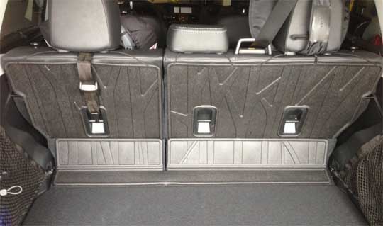 a rear seatback protector made for the 2015 Forester installed on a 2014 model.