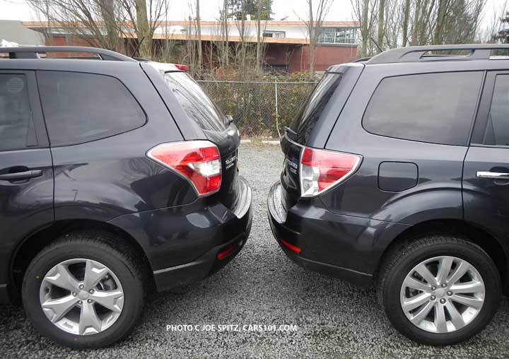 dark gray 2014 and 2013 subaru forester premiums, back-to-back