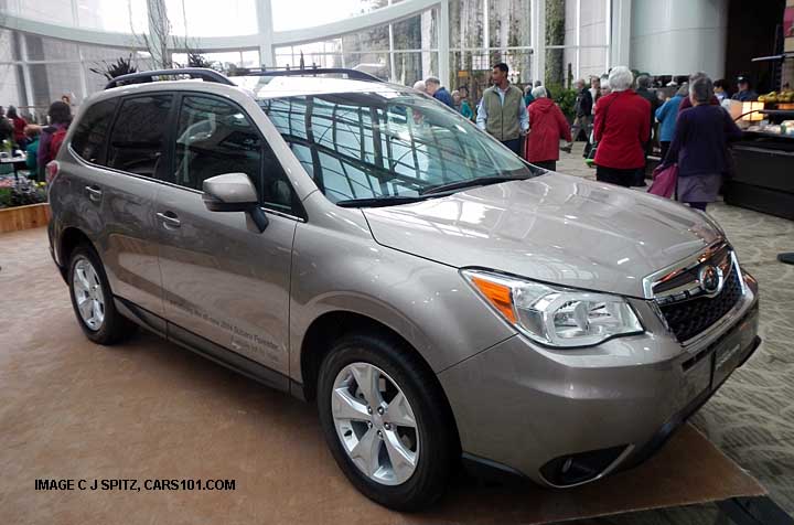 front and side 2014 forester touring, bronze color