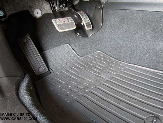 Subaru Forester optional medal gas and brake pedals. also all weather rubber floor mat