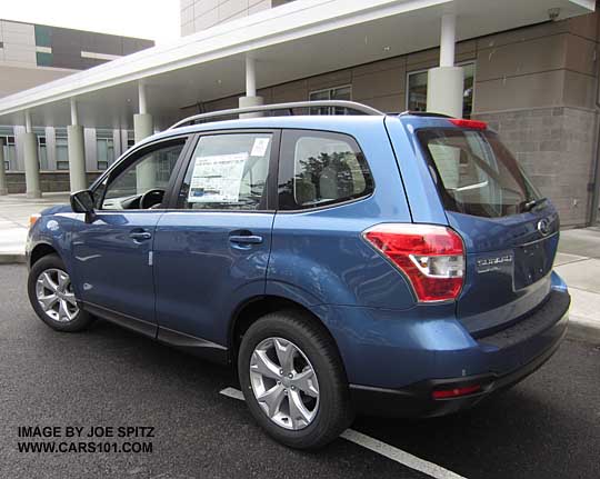 Quartz blue 2015 Forester 2.5i with optional alloy wheel roof rack package