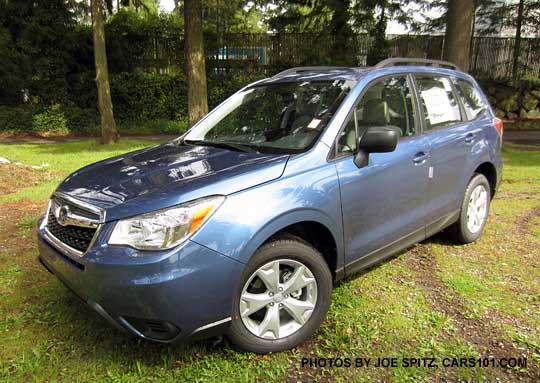 quartz blue 2015 Forester with new for 2015 alloy wheel roof rack package