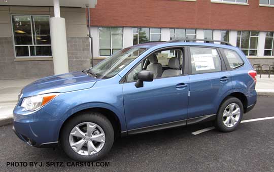 quartz blue 2015 Forester with new for 2015 alloy wheel roof rack package