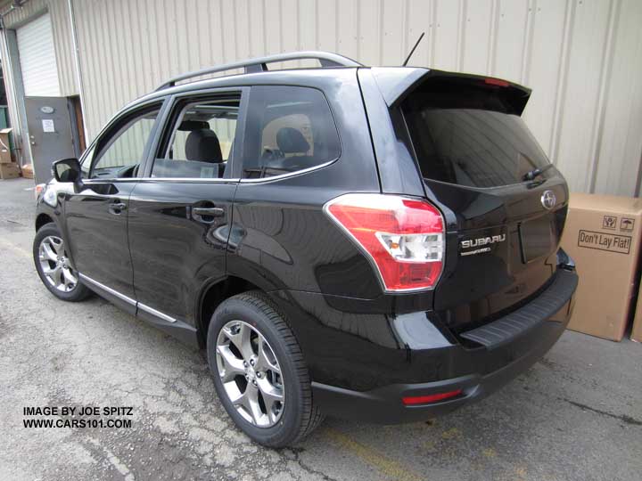 rear view black 2016 ,2015 Forester 2.5 Touring with 18" silver alloys and lower chrome accent strip. Optional rear bumper cover. NO splash guards