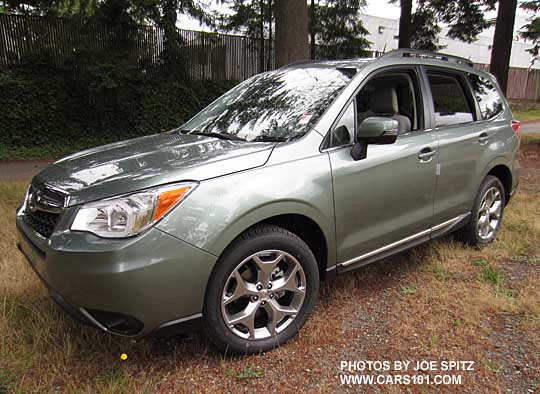 2015 Subaru Forester 2.5 Touring side view with new chrome strip, jasmine green color