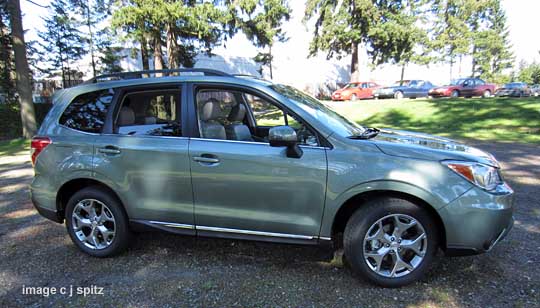 side view 2015 subaru forester touring with new chrome accent strip, silver 18" alloys